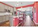 Modern kitchen with stainless steel appliances and an open floor plan at 18000 E 100Th Ave, Commerce City, CO 80022