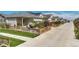 Community view showing house and backyard with a fence at 18000 E 100Th Ave, Commerce City, CO 80022