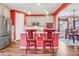 Open kitchen with island seating and a breakfast bar at 18000 E 100Th Ave, Commerce City, CO 80022