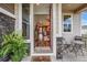 Inviting front entry with a cozy sitting area at 18000 E 100Th Ave, Commerce City, CO 80022