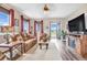 Open concept living room with hardwood floors and natural light at 18000 E 100Th Ave, Commerce City, CO 80022