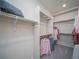 Spacious walk-in closet with built-in shelving and plenty of hanging space at 5176 N Quemoy Ct, Aurora, CO 80019