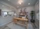 Well-lit home office with a desk, shelves, and decorative accents at 5176 N Quemoy Ct, Aurora, CO 80019