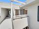 Balcony view overlooking a common area of the condo building at 1830 Newland Ct # 323, Lakewood, CO 80214