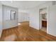 Clean bathroom with wood vanity and a large mirror at 1830 Newland Ct # 323, Lakewood, CO 80214
