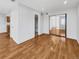 Spacious bedroom with hardwood floors and mirrored closet doors at 1830 Newland Ct # 323, Lakewood, CO 80214