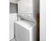 Stackable washer and dryer in the laundry closet at 1830 Newland Ct # 323, Lakewood, CO 80214