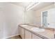 Bathroom with double sinks and a shower at 9216 W 107Th Pl, Westminster, CO 80021