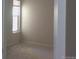 Simple carpeted bedroom with large window at 12172 Huron St # 207, Denver, CO 80234