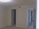 Bedroom with doors to closet and bathroom at 12172 Huron St # 207, Denver, CO 80234