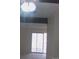 Living room with sliding glass doors leading to a balcony at 12172 Huron St # 207, Denver, CO 80234
