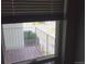 View of a small private patio from inside at 12172 Huron St # 207, Denver, CO 80234
