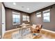 Home office with hardwood floors and built-in shelving at 8152 E 49Th Pl, Denver, CO 80238