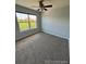 Spacious bedroom with ceiling fan and carpet at 23671 E Alabama Dr, Aurora, CO 80018