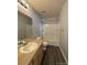 Bathroom with single vanity, toilet, and bathtub at 23671 E Alabama Dr, Aurora, CO 80018