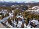 Aerial view showcasing log cabin and mountain landscape at 878 American Way, Breckenridge, CO 80424