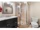 Bathroom with walk-in shower and granite vanity at 878 American Way, Breckenridge, CO 80424
