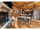Stone fireplace as a focal point in the cabin at 878 American Way, Breckenridge, CO 80424