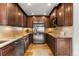 Modern kitchen with stainless steel appliances and granite countertops at 878 American Way, Breckenridge, CO 80424