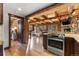 Kitchen with stainless steel appliances and view into living room at 878 American Way, Breckenridge, CO 80424