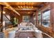 Living area with log cabin details and comfy seating at 878 American Way, Breckenridge, CO 80424