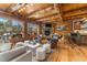 Open concept living area with kitchen and fireplace at 878 American Way, Breckenridge, CO 80424