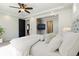 Main bedroom with a large bed, carpet floors, and a ceiling fan at 1178 Freedom Way, Castle Rock, CO 80109