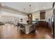 Spacious kitchen with an island and dark wood cabinets at 1178 Freedom Way, Castle Rock, CO 80109