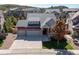 Two-story house with attached garage and front yard at 1178 Freedom Way, Castle Rock, CO 80109