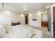Main bedroom with ensuite bathroom and lots of natural light at 1178 Freedom Way, Castle Rock, CO 80109