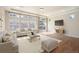 Living area with hardwood floors, sliding glass doors and neutral decor at 1178 Freedom Way, Castle Rock, CO 80109