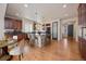 Open kitchen with an island, breakfast nook, and hardwood floors at 1178 Freedom Way, Castle Rock, CO 80109