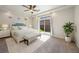 Spacious main bedroom with carpeted floors and backyard access at 1178 Freedom Way, Castle Rock, CO 80109