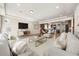 Bright living room with hardwood floors and open layout at 1178 Freedom Way, Castle Rock, CO 80109