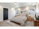 Bright bedroom with large window, carpeted floor, and built-in shelving at 1178 Freedom Way, Castle Rock, CO 80109