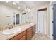 Shared bathroom with double vanity and shower/tub combo at 1178 Freedom Way, Castle Rock, CO 80109