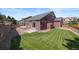 Spacious backyard with patio, shed, and grassy area at 1178 Freedom Way, Castle Rock, CO 80109