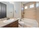 Bathroom with tub, shower, and single vanity at 1178 Freedom Way, Castle Rock, CO 80109