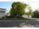 House with large tree and autumn leaves at 19232 E Adriatic Pl, Aurora, CO 80013