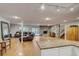 Spacious basement recreation area with a stone fireplace at 12000 W 29Th Pl, Wheat Ridge, CO 80215