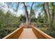 Charming backyard with bridge and mature trees at 12000 W 29Th Pl, Wheat Ridge, CO 80215