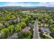 Aerial view of neighborhood with mountain views at 12000 W 29Th Pl, Wheat Ridge, CO 80215