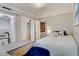 Charming bedroom with a closet, desk and a double bed at 12000 W 29Th Pl, Wheat Ridge, CO 80215