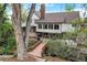 House with large backyard, wooden bridge and mature trees at 12000 W 29Th Pl, Wheat Ridge, CO 80215