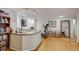 Finished basement with wet bar, exercise equipment, and shelving at 12000 W 29Th Pl, Wheat Ridge, CO 80215