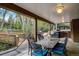 Relaxing patio with outdoor dining furniture and a view of the backyard at 12000 W 29Th Pl, Wheat Ridge, CO 80215