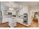 Modern kitchen with stainless steel appliances and island at 12000 W 29Th Pl, Wheat Ridge, CO 80215