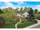 House front with manicured lawn and landscaping at 12000 W 29Th Pl, Wheat Ridge, CO 80215