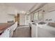 Convenient laundry room with washer, dryer, and extra counter space at 12000 W 29Th Pl, Wheat Ridge, CO 80215