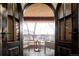 Private balcony with outdoor seating and treetop views at 2435 S Milwaukee St, Denver, CO 80210